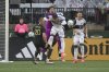 Vancouver Whitecaps goalkeeper Yohei Takaoka, center top, grabs for the ball behind defender Tristan Blackmon (33), defender Ranko Veselinović (4), and Portland Timbers defender Finn Surman (20) during the first half of an MLS soccer game Sunday, Feb. 23, 2025, in Portland, Ore. (AP Photo/Amanda Loman)