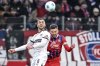 FILE - Heidenheim's Patrick Mainka, right, and St. Pauli's James Sands, left, go for a header during the German Bundesliga soccer match between 1. FC Heidenheim and FC St. Pauli in Munich, Germany, Saturday, Jan. 18, 2025.(Harry Langer/dpa via AP, File)