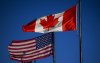The head of the Canadian Federation Independent Business says across-the-board U.S. tariffs on imported goods would be a worst-case scenario if they kick in tomorrow. A Canadian and an American flag fly outside a hotel in Ottawa, on Saturday, Feb. 1, 2025. THE CANADIAN PRESS/Justin Tang