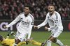 Real Madrid's Rodrygo, left, celebrates with his teammate Kylian Mbappe after scoring his side's third goal during the Champions League opening phase soccer match between Brest and Real Madrid at Roudourou stadium in Guingamp, France, Wednesday, Jan. 29, 2025. (AP Photo/Thibault Camus)