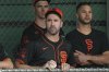 San Francisco Giants pitchers Justin Verlander, center, Joey Lucchesi, right, and Carson Ragsdale watches other pitchers throw at the team's spring training baseball facility Thursday, Feb. 13, 2025, in Scottsdale, Ariz. (AP Photo/Ross D. Franklin)