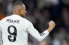 Real Madrid's Kylian Mbappe celebrates after scoring his sides third goal during the Champions League playoff second leg soccer match between Real Madrid and Manchester City at the Santiago Bernabeu Stadium in Madrid, Spain, Wednesday, Feb. 19, 2025. (AP Photo/Manu Fernandez)
