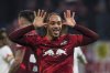 Leipzig's Xavi Simons celebrates after scoring during a Bundesliga soccer match against St. Pauli in Leipzig, Germany, Sunday, Feb. 9, 2025. (Jan Woitas/dpa via AP)