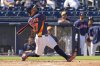 Houston Astros' Jose Altuve flies out during the third inning of a spring training baseball game against the St. Louis Cardinals Friday, Feb. 28, 2025, in West Palm Beach, Fla. (AP Photo/Jeff Roberson)