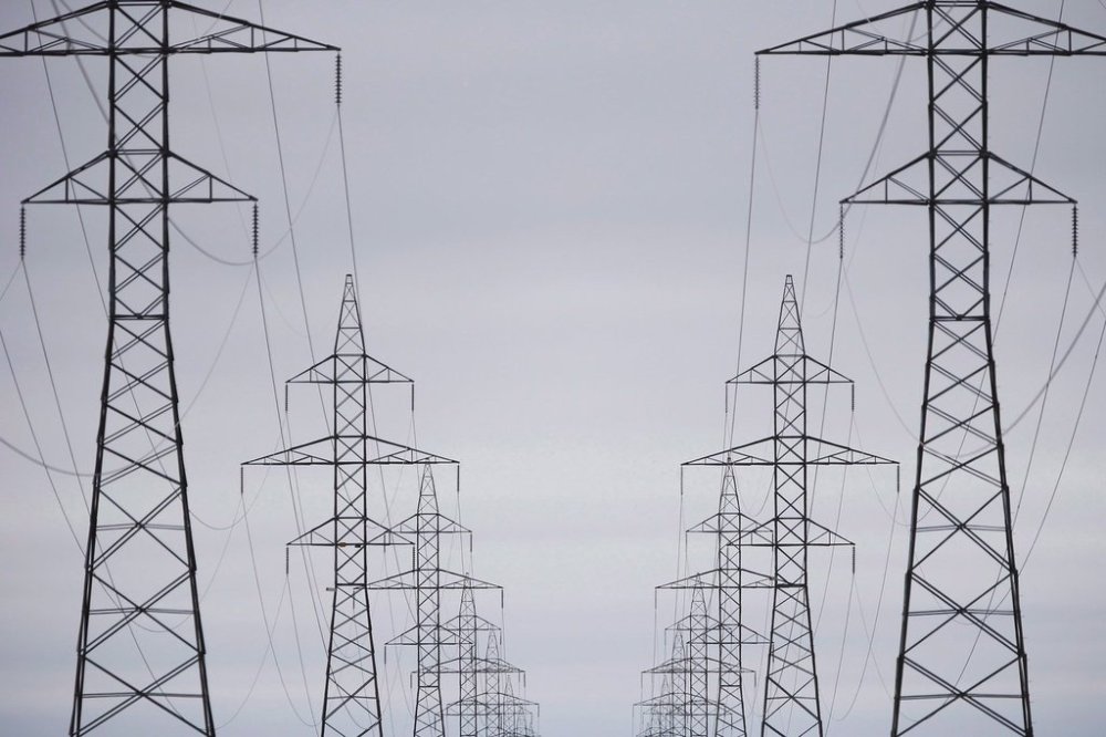 Manitoba Hydro power lines are photographed just outside Winnipeg, Monday, May 1, 2018. While the Manitoba government has promised to keep electricity rates low, the province's energy Crown corporation is asking people for their thoughts on a rate hike for electricity and changes that could see different rates applied at different times of the day. THE CANADIAN PRESS/John Woods