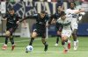 CF Monterrey's Nelson Deossa (left) tries to break away from Vancouver Whitecaps FC's  Mathias Laborda during the first half of CONCACAF Champions Cup soccer action in Vancouver, B.C., Wednesday, March 5, 2025. THE CANADIAN PRESS/Rich Lam