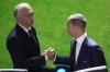 FILE - UEFA President Aleksander Ceferin, right, shakes hands with member of executive committee Alexander Dyukov during the 48th UEFA congress, Feb. 8, 2024 in Paris. (AP Photo/Christophe Ena, file)