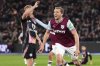 West Ham United's Tomas Soucek celebrates scoring during the English Premier League soccer match between West Ham United and Leicester City at the London Stadium, London, Thursday Feb. 27, 2025. (John Walton/PA via AP)