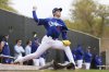 Los Angeles Dodgers pitcher Roki Sasaki, of Japan, throws during a pitching session at the team's baseball spring training facility Wednesday, Feb. 12, 2025, in Phoenix. (AP Photo/Ross D. Franklin)