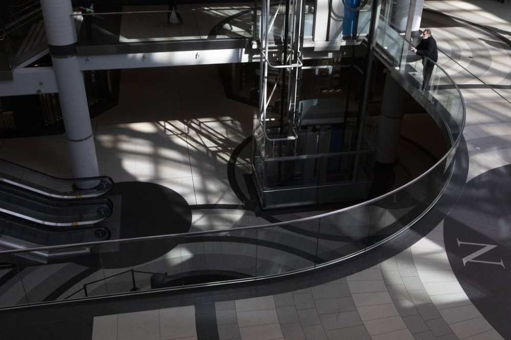 A new report says fears of a trade dispute with the United States have pushed consumer confidence in Canada to its lowest level since the pandemic. A man leans on a railing at Toronto's Eaton Centre shopping mall on Saturday March 21, 2020. THE CANADIAN PRESS/Chris Young