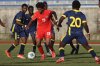 Canada's Marius Aiyenero (19) competes for the ball with Turks and Caicos' Kanye Robinson (20) in CONCACAF U-17 men's qualifying play in a Sunday, Feb. 9, 2025 handout photo at the National Sports Centre in Devonshire Parish, Bermuda. THE CANADIAN PRESS/HO, Victor Straffon, CONCACAF *MANDATORY CREDIT*