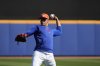 New York Mets' Juan Soto throws during a spring training baseball practice Monday, Feb. 17, 2025, in Port St. Lucie, Fla. (AP Photo/Jeff Roberson)
