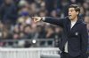 Lyon's head coach Paulo Fonseca gives instructions to his players during the French League One soccer match between Lyon and Paris Saint-Germain at the Groupama stadium, outside Lyon, France, Sunday, Feb. 23, 2025. (AP Photo/Laurent Cipriani)