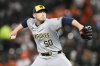 FILE Milwaukee Brewers pitcher JB Bukauskas throws during a baseball game against the Baltimore Orioles, Friday, April 12, 2024, in Baltimore. (AP Photo/Nick Wass, File)