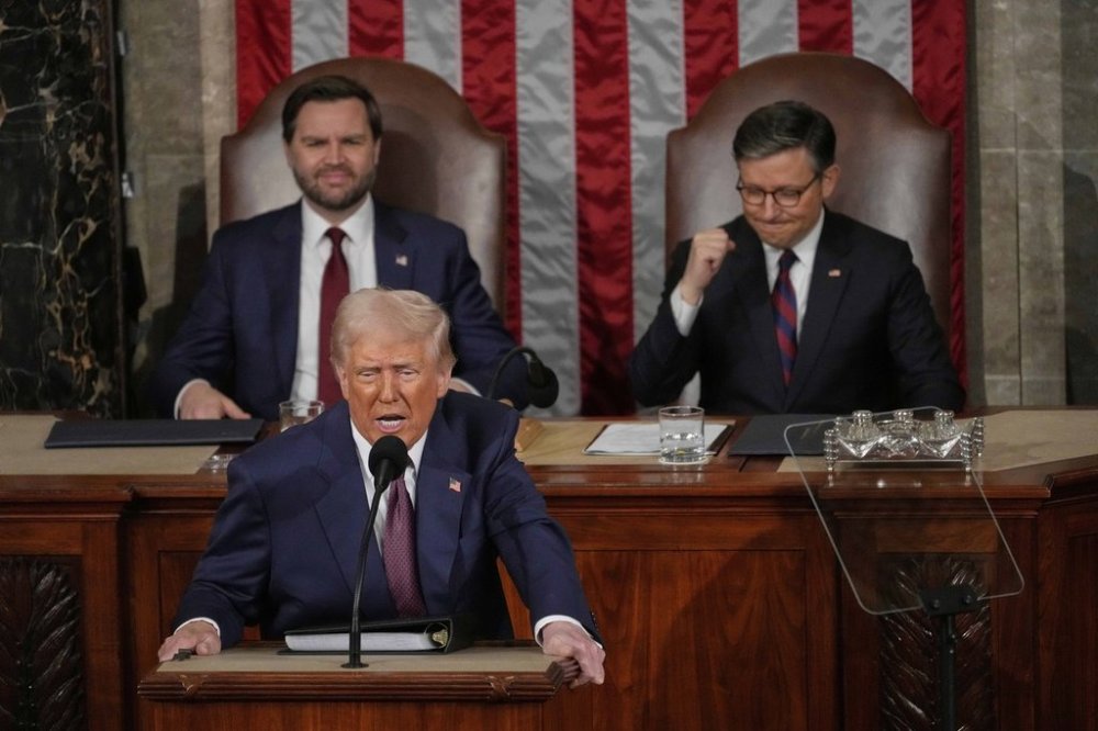 President Donald Trump addresses a joint session of Congress in the House chamber at the U.S. Capitol in Washington, Tuesday, March 4, 2025, as Vice President JD Vance and House Speaker Mike Johnson of La., listen. (AP Photo/Julia Demaree Nikhinson)
