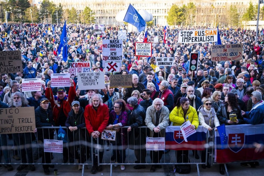 People gather to take part at a protest called
