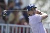 Jake Knapp, of the United States, watches his shot on the first tee during the first round of the Mexico Open golf tournament in Puerto Vallarta, Mexico, Thursday, Feb. 20, 2025. (AP Photo/Fernando Llano)