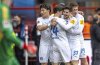 Holstein Kiel's Armin Gigovic, front right, celebrates after scoring the opening goal during the German Bundesliga soccer match between 1. FC Union Berlin and Holstein Kiel in Berlin, Germany, Sunday, March 2, 2025. (Andreas Gora/dpa via AP)