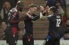 Crystal Palace's Justin Devenny, center, celebrates with his teammates Daniel Munoz, right, and Jean-Philippe Mateta, left, after scoring his side's second goal during the FA Cup fourth round match between Doncaster Rovers and Crystal Palace in Doncaster, England, Monday, Feb. 10, 2025. (Danny Lawson/PA via AP)