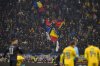 FILE - Romanian fans wave a banner in the colors of Serbia and Romania national flags during the UEFA Nations League soccer match between Romania and Kosovo was suspended at the National Arena stadium in Bucharest, Romania, Saturday, Nov. 16, 2024. (AP Photo/Alexandru Dobre, File)