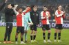 Feyenoord's Igor Paixao, left, and team mates salute fans after the the Champions League playoff first leg soccer match between Feyenoord and AC Milan, at the De Kuip stadium, in Rotterdam, Netherlands, Wednesday, Feb. 12, 2025. (AP Photo/Peter Dejong)