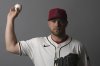 FILE - This is a 2025 photo of pitcher Corbin Burnes of the Arizona Diamondbacks baseball team. This image reflects the Diamondbacks active roster as of Wednesday, Feb. 19, 2025, in Scottsdale, Ariz., when this image was taken. (AP Photo/Ross D. Franklin, File)