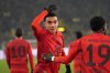 FILE - Bayern's Jamal Musiala celebrates after scoring during their German Bundesliga soccer match against Borussia Dortmund at the Signal-Iduna Park in Dortmund, Germany, Saturday, Nov. 30, 2024. (AP Photo/Martin Meissner, file)