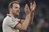 Munich's Harry Kane applauds supporters after the Champions League round of 16 first leg soccer match between FC Bayern Munich and Bayer 04 Leverkusen in Munich, Germany, Wednesday, March 5, 2025. (Peter Kneffel/dpa via AP)