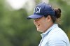 Angel Yin of the U.S. smile after her putt the eighth hole during final round of the LPGA Honda Thailand golf tournament in Pattaya, southern Thailand, Sunday, Feb. 23, 2025. (AP Photo/Kittinun Rodsupan)