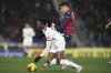 AC Milan's Rafael Leao, left, and Bologna's Santiago Castro in action during the Serie A soccer match between Bologna FC and A.C. Milan at Renato Dall'Ara Stadium, Bologna, Italy, Thursday, Feb. 27, 2025. (Michele Nucci/LaPresse via AP)