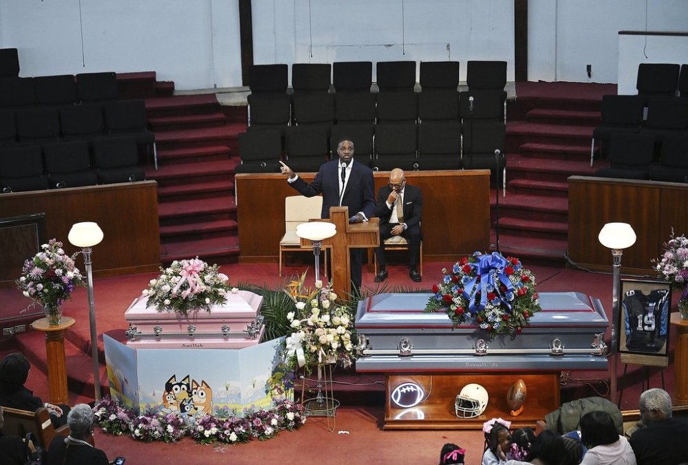 Pastor Solomon Kinloch speaks during the eulogy for A'millah Currie, 2, and Darnell Currie, Jr., during the funeral services at Triumph Church on Thursday, Feb. 20, 2025, Detroit. (Clarence Tabb Jr./Detroit News via AP)