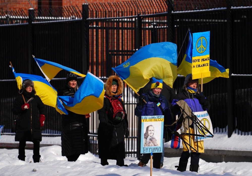 People demonstrate against the war in Ukraine in front of the Russian embassy in Ottawa on Friday, Feb. 24, 2023. THE CANADIAN PRESS/Sean Kilpatrick