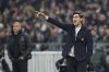 Lyon's head coach Paulo Fonseca gives instructions to his players during the French League One soccer match between Lyon and Paris Saint-Germain at the Groupama stadium, outside Lyon, France, Sunday, Feb. 23, 2025. (AP Photo/Laurent Cipriani)