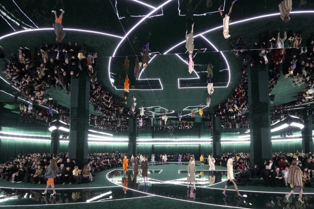 A model wears a creation as part of the Gucci Fall/Winter 2025-2026 men's and women's collection, presented in Milan, Italy, Tuesday, Feb. 25, 2025. (AP Photo/Luca Bruno)