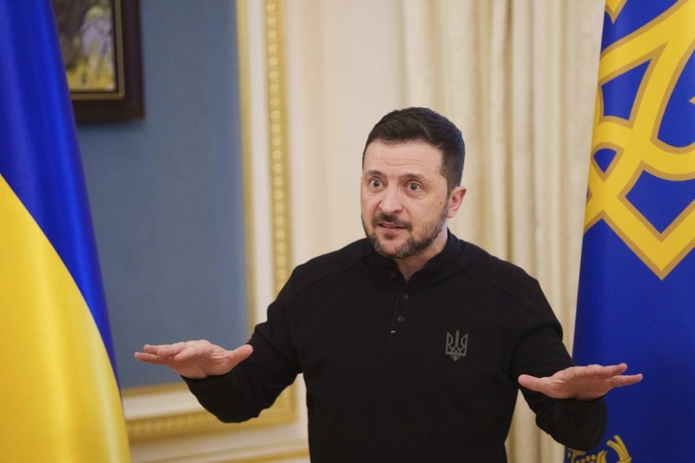Ukrainian President Volodymyr Zelenskyy speaks to journalists during press conference in Kyiv, Ukraine, Wednesday, Feb. 26, 2025. (AP Photo/Evgeniy Maloletka)