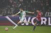 Feyenoord's Bart Nieuwkoop kicks the ball in front of Lille's Osame Sahraoui during the Champions League opening phase soccer match between Lille and Feyenoord at the Stade Pierre Mauroy in Villeneuve-d'Ascq, outside Lille, northern France, Wednesday, Jan. 29, 2025. (AP Photo/Michel Euler)