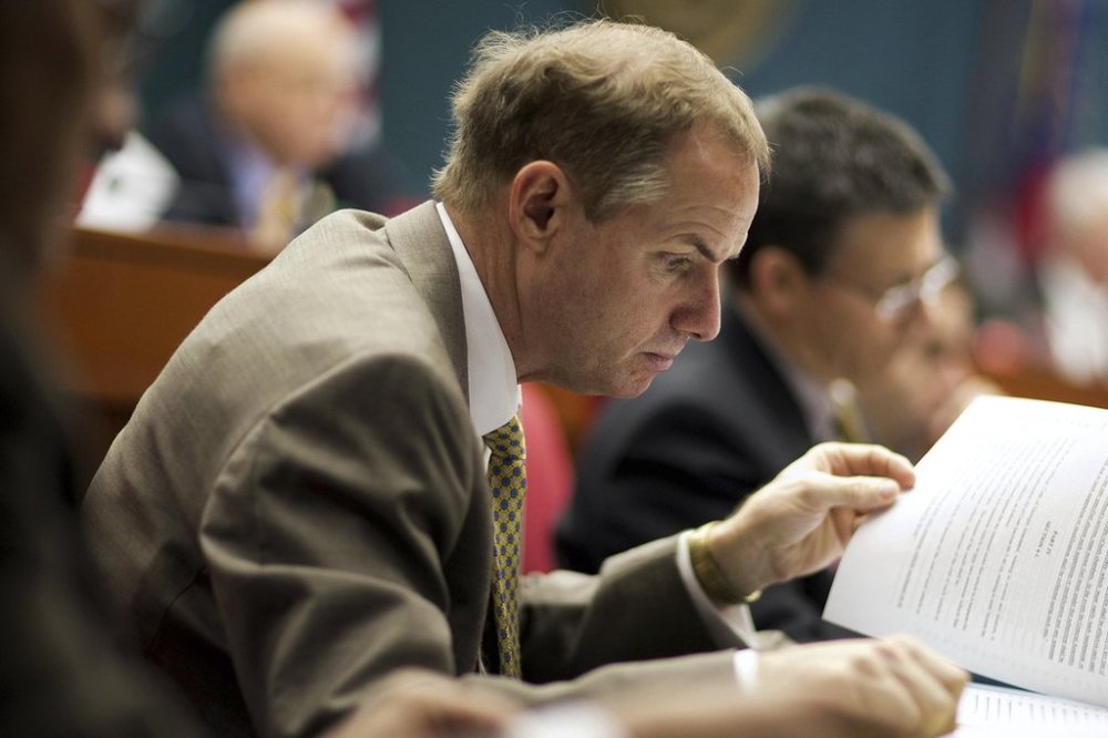 FILE - State Rep. Bill Werkheiser, R-Glennville, looks over a bill during a House Transportation committee meeting, on Feb. 12, 2015, in Atlanta. (AP Photo/David Goldman, File)