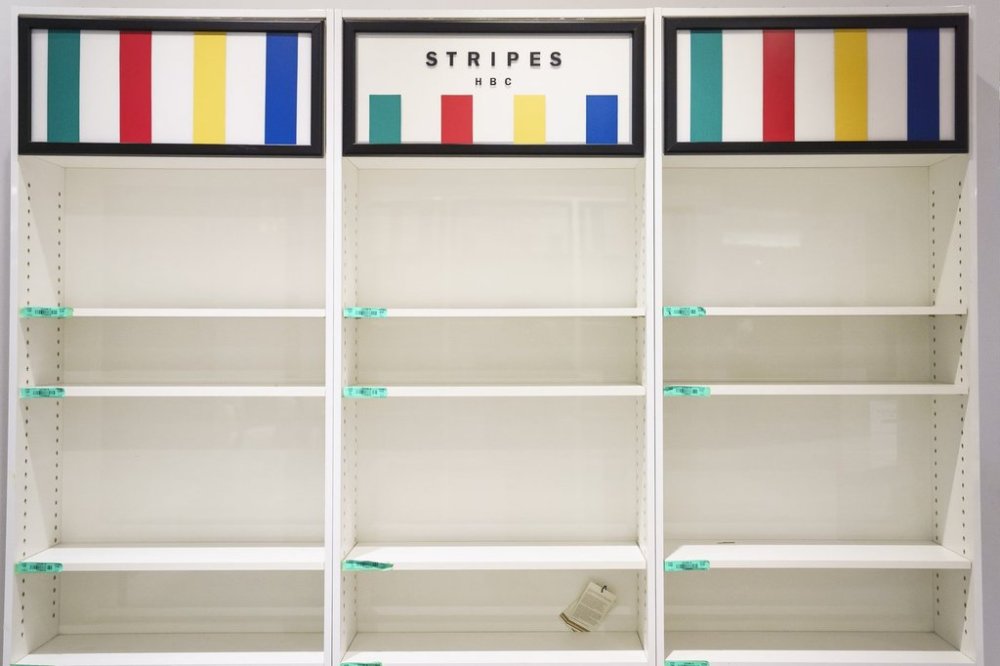 Empty shelves are seen at a Hudson's Bay in Toronto on Monday, March 17, 2025. THE CANADIAN PRESS/Christopher Katsarov