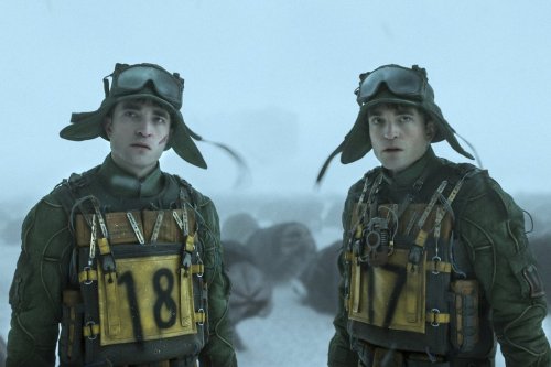 This image released by Warner Bros. Pictures shows Robert Pattinson as Mickey 18, left, and Mickey 17 in a scene from 