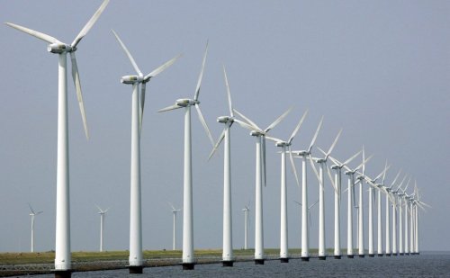 In this July 27, 2006, file photo, wind turbines stand clustered offshore in Dronten, the Netherlands. THE CANADIAN PRESS/AP-Peter Dejong