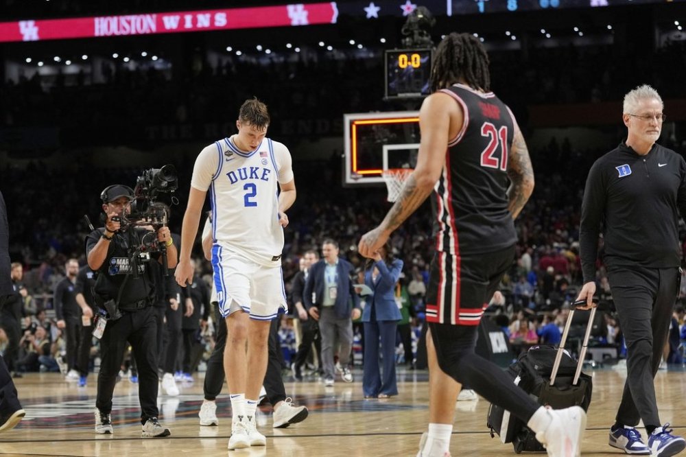 Duke's Cooper Flagg (2) walks off the court after Duke lost to Houston in the national semifinals at the Final Four of the NCAA college basketball tournament, Saturday, April 5, 2025, in San Antonio. (AP Photo/Eric Gay)