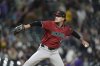 FILE - Arizona Diamondbacks relief pitcher Blake Walston (48) in the seventh inning of a baseball game Tuesday, Sept. 17, 2024, in Denver. (AP Photo/David Zalubowski, File)
