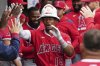 Los Angeles Angels' Kyren Paris celebrates with teammates after hitting a solo home run during the eighth inning of a baseball game against the Chicago White Sox in Chicago, Sunday, March 30, 2025. (AP Photo/Nam Y. Huh)