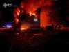 In this photo provided by the Ukrainian Emergency Service, firefighters put out the fire following a Russian rocket attack in Dobropillya, Donetsk region, Ukraine, Saturday, March 8, 2025. (Ukrainian Emergency Service via AP)