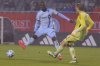 Chicago Fire goalkeeper Chris Brady (1) passes the ball past CF Montréal forward Prince Osei Owusu (9) during the second half of an MLS soccer match Saturday, March 29, 2025, in Chicago. (AP Photo/Melissa Tamez)