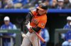 Baltimore Orioles' Jackson Holliday hits a two-run single during the sixth inning of a baseball game against the Kansas City Royals, Saturday, April 5, 2025, in Kansas City, Mo. (AP Photo/Charlie Riedel)