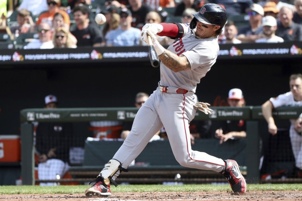 Boston Red Sox outfielder Jarren Duran lines out during the seventh inning of a baseball game against the Baltimore Orioles, Thursday, April 3, 2025, in Baltimore. (AP Photo/Daniel Kucin Jr.)