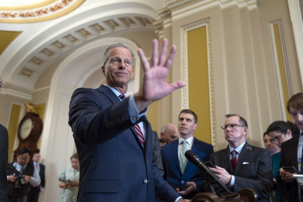Senate Majority Leader John Thune, R-S.D., speaks to reporters as Republicans work to pass an interim spending bill that would avoid a partial government shutdown and keep federal agencies funded through September, at the Capitol in Washington, Tuesday, March 11, 2025. (AP Photo/J. Scott Applewhite)