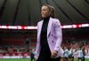 Canada women's national team soccer head coach Casey Stoney walks to the bench before an international friendly soccer match against Argentina in Vancouver, on Friday, April 4, 2025. THE CANADIAN PRESS/Ethan Cairns