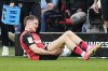Leverkusen's Florian Wirtz gets injured and has to leave the pitch during the Bundesliga soccer match between Bayer Leverkusen and Werder Bremen at the BayArena in Leverkusen, Germany, Saturday, March 8, 2025. (AP Photo/Martin Meissner)